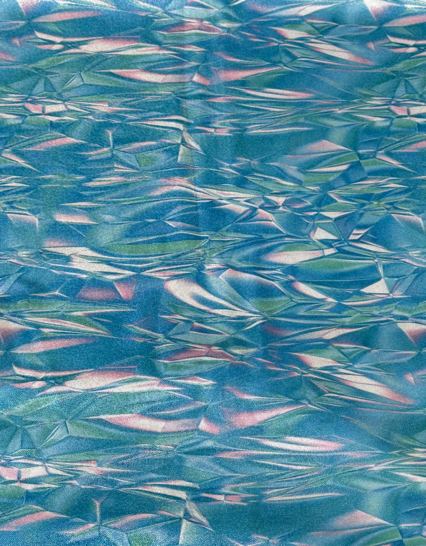 Textured blue and green fabric pattern