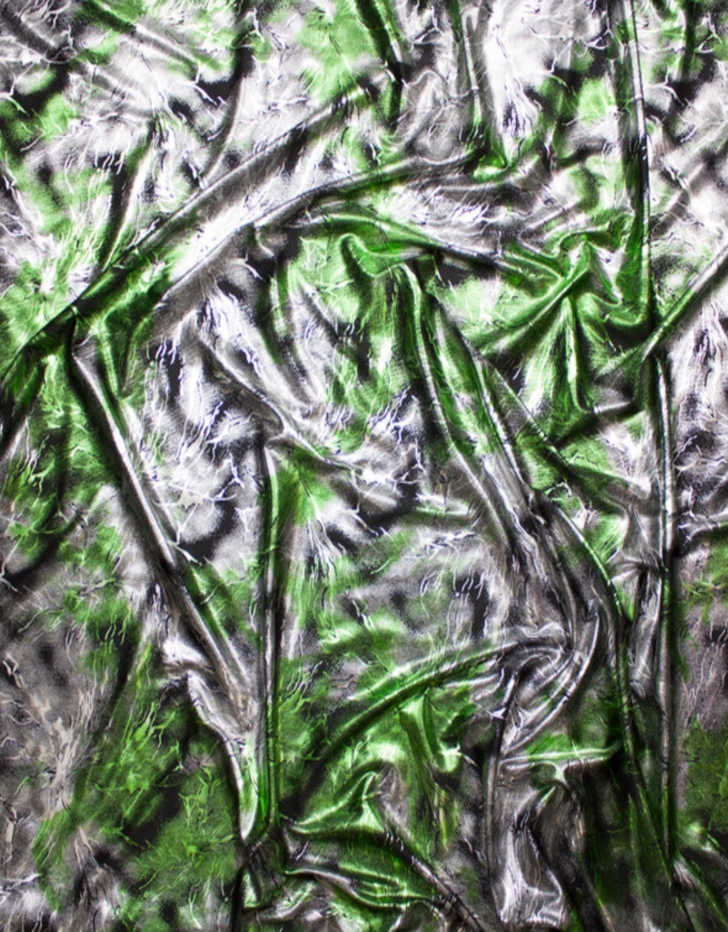 Close-up of green and silver metallic fabric