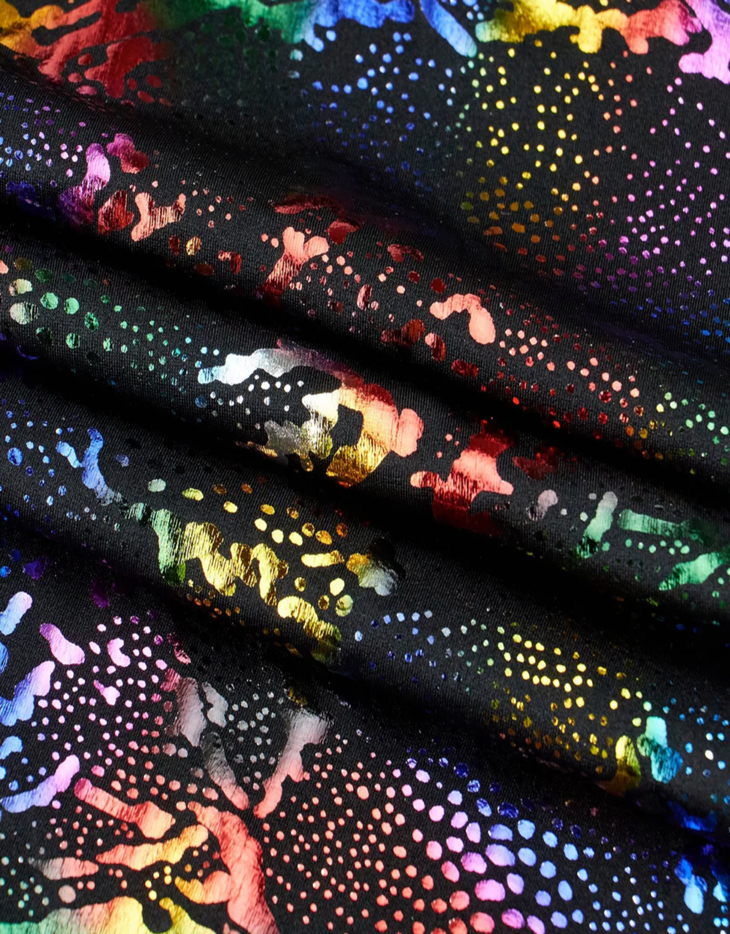 Colorful fabric with abstract patterns on a black background