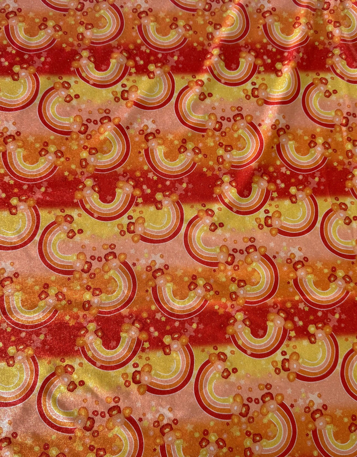 Patterned fabric with red, yellow, and orange colors