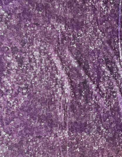 Purple fabric with a textured pattern