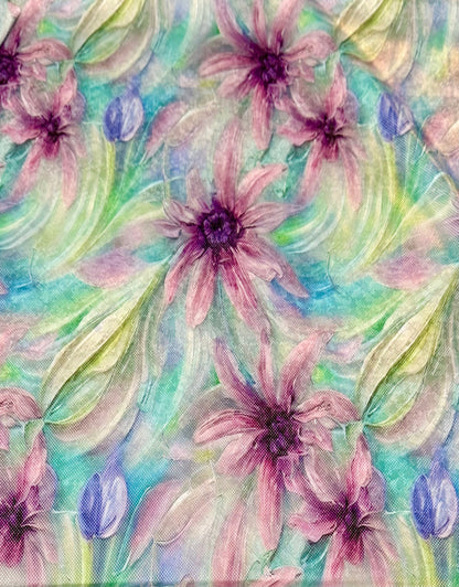 Colorful floral pattern with pink and purple flowers on a multicolored background