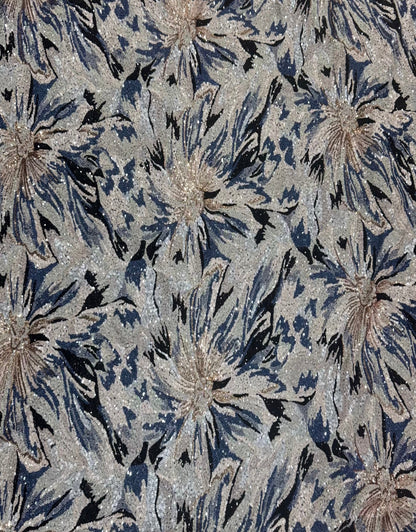 Patterned fabric with floral design in blue and silver
