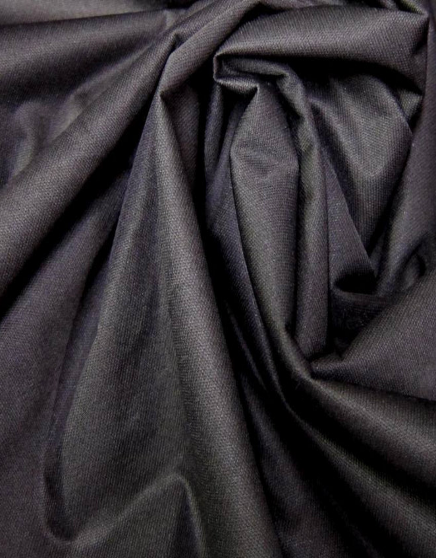 Close-up of dark fabric with folds