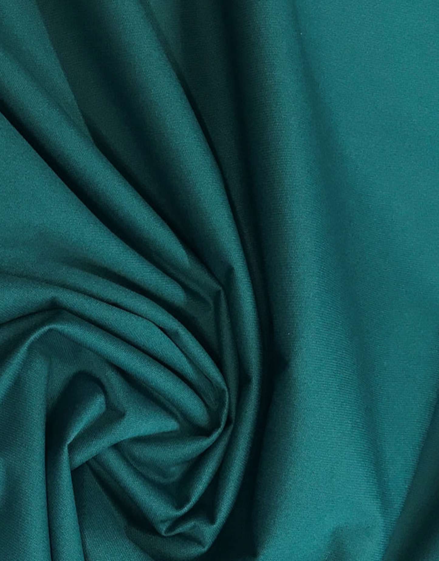 Teal fabric with folds and texture