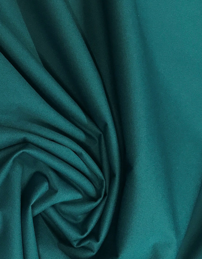 Teal fabric with folds and texture